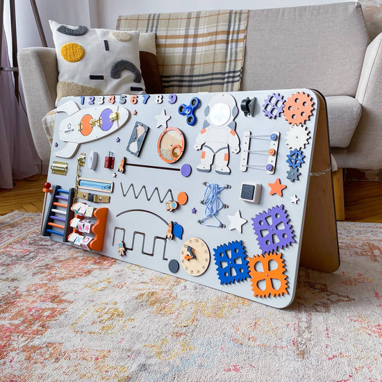 Space. Busy board and drawing board for the development of children from six months.