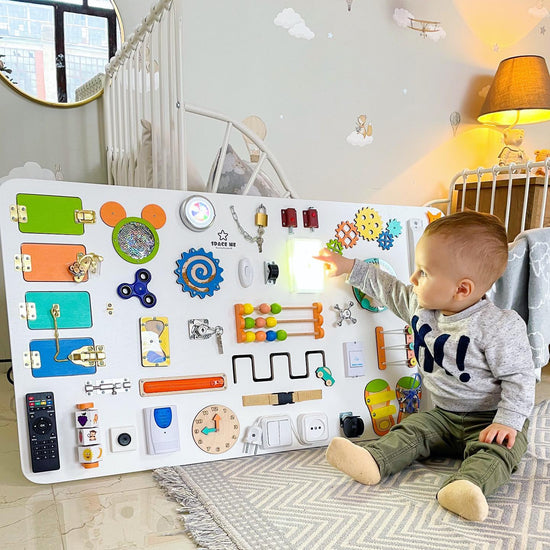 Busy board for developing motor skills Montessori "Light play" 100х50